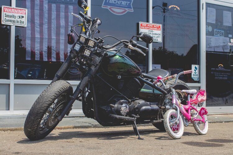 HD Transmission and Auto Repair will take a little time this summer to shift from typical auto repairs and help the community with kids' bike repairs.