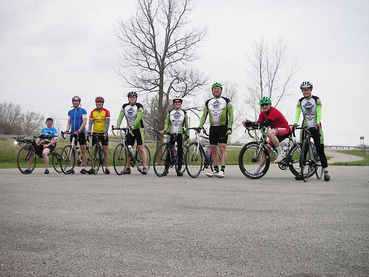 Cyclists take a break along the path that goes from West Liberty to Xenia.