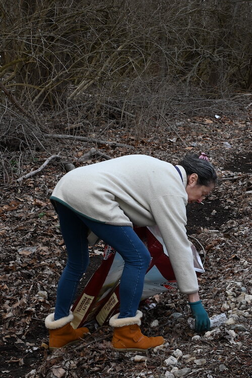 Miracle Mile Hill is a beautiful nature area that deer roam on, says Mary Katherine Somers. "It has become littered and deer now walk on trash, heartbreaking. So I try to keep it litter-free. The bag I am re-using is from a local farmer’s feed, a gre