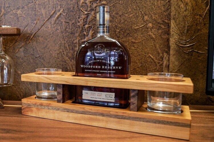 One of the smaller, popular items built and sold by Keener & Schultz Fine Woodworks is a holder to display a bottle of Woodford Reserve bourbon and glasses.