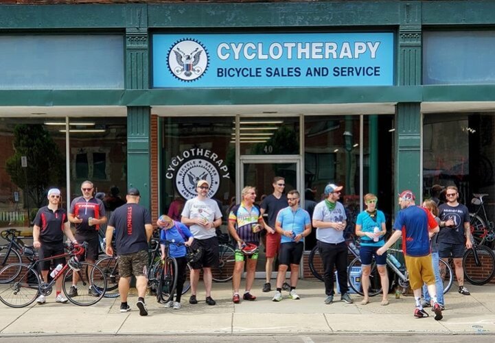 A group of cyclists gathered for a bike ride from Cyclotherapy to Yellow Springs and back. 